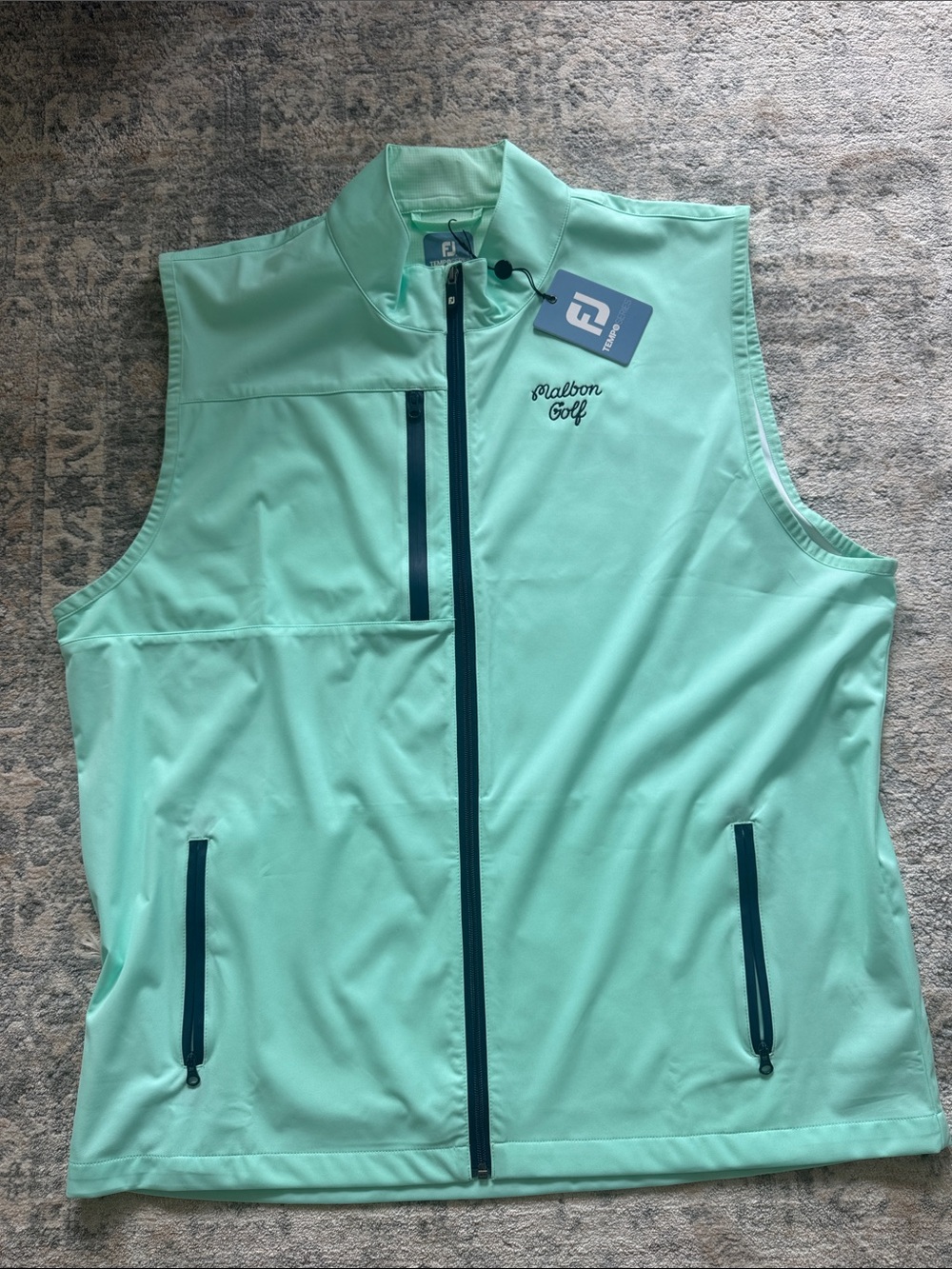 Malbon Golf : FootJoy Men's Mint Golf Vest with Navy Trim